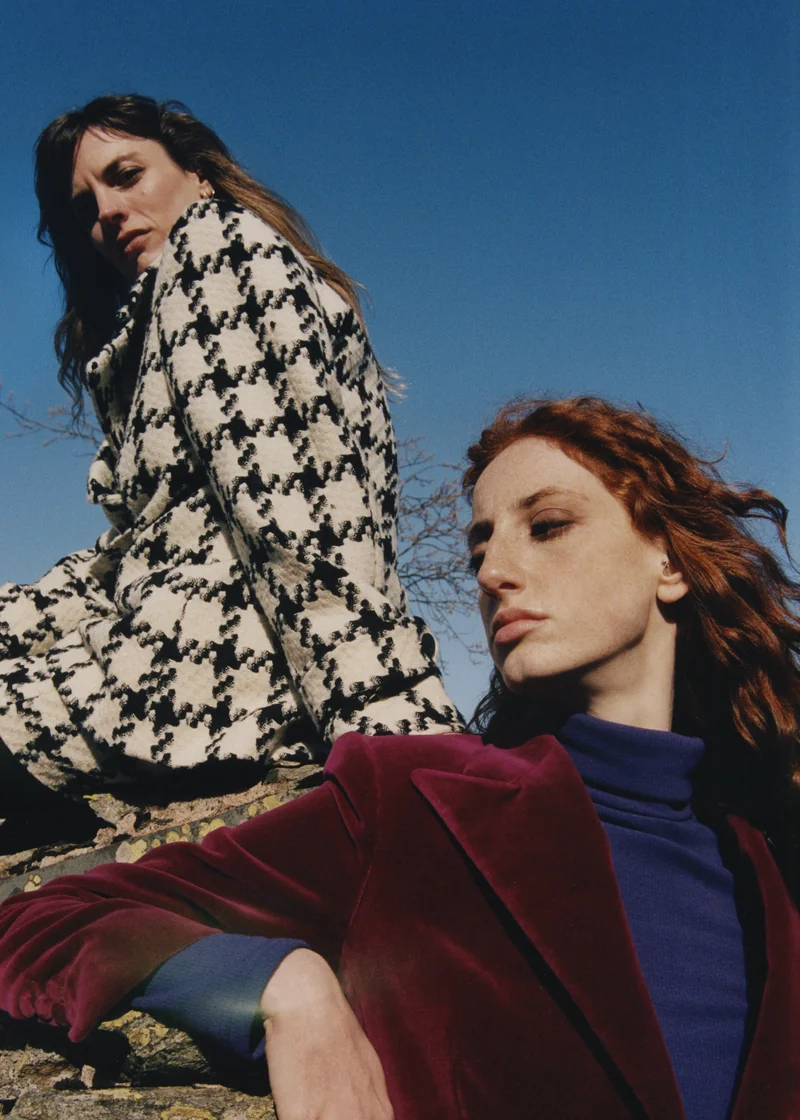 Houndstooth coat and burgundy velvet jacket